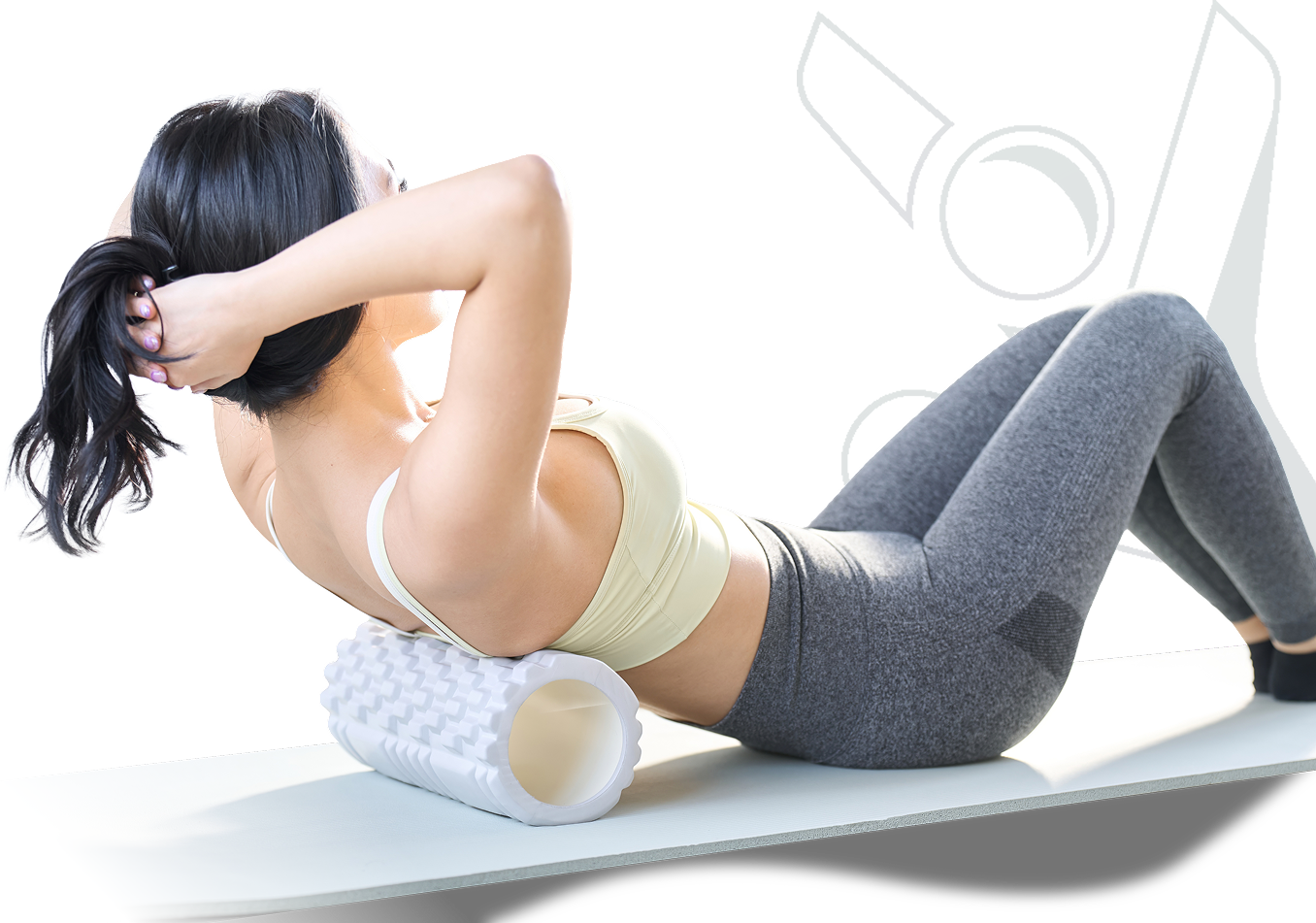 Woman lying on a mat using a textured foam roller under her upper back for stretching and mobility.